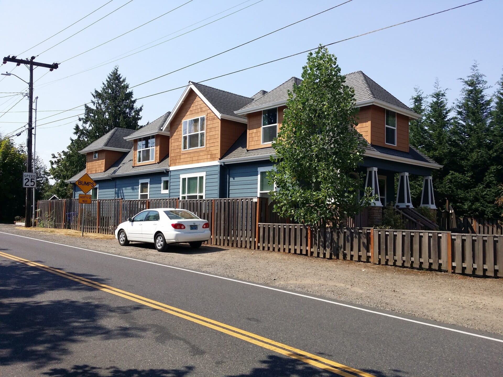 Exterior painting of two-story homes with lap siding