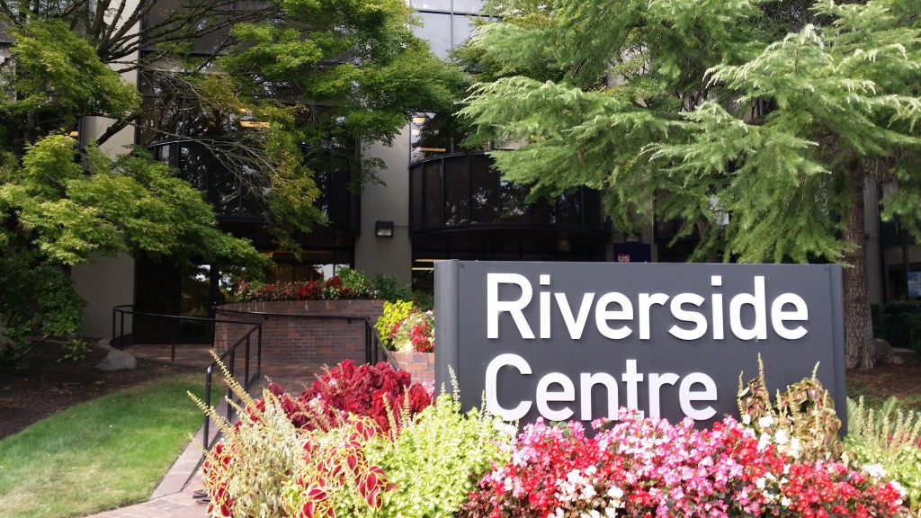 Exterior commercial painting in Portland Oregon. Cascade painting and restoration brand Riverside centre exterior repaint