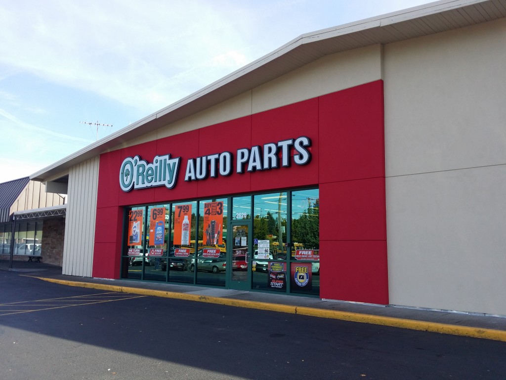 Exterior commercial painting in Portland Oregon. Cascade painting and restoration. brand oreilly auto parts painting exterior