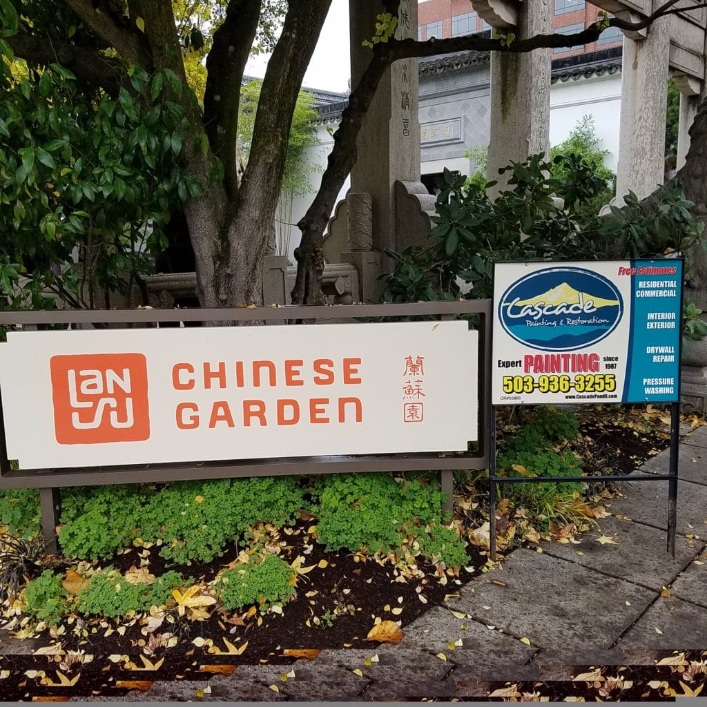 Exterior residential painting in Portland Oregon. Cascade painting and restoration logo exterior commercial