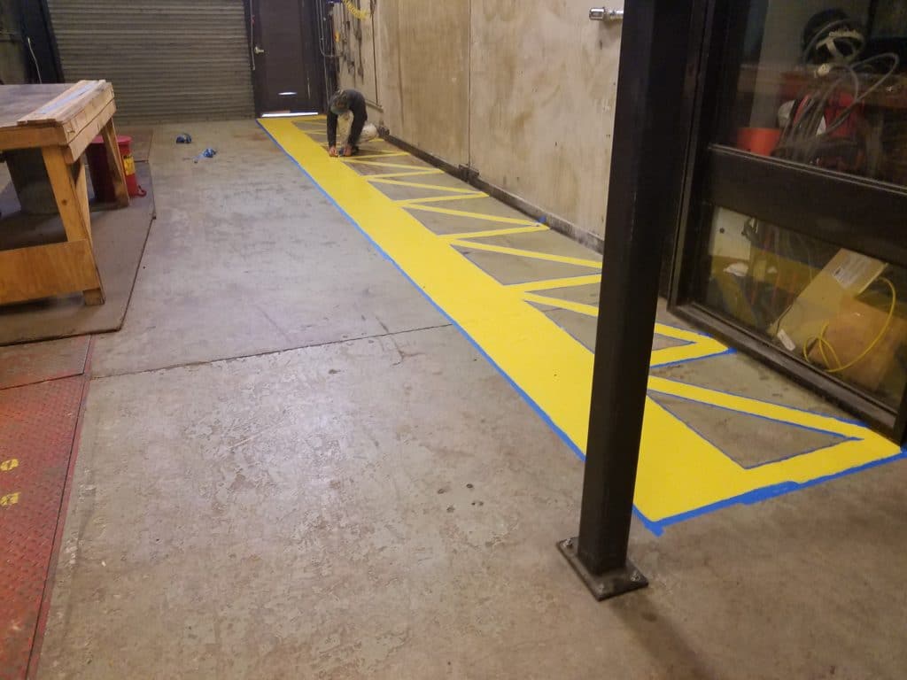 Interior commercial painting in Portland Oregon. Cascade painting and restoration retail repaint tenant improvement specialty painting warehouse