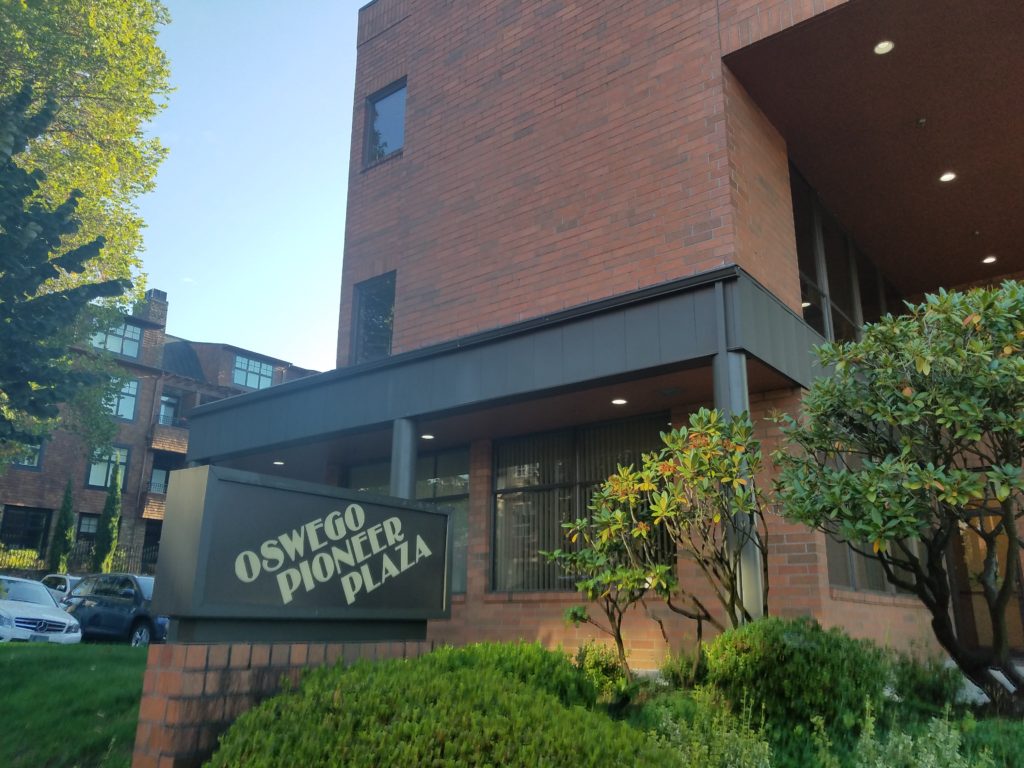 Exterior commercial painting in portland Oregon. Cascade painting and restoration. Oswego Pioneer plaza. brand Lake Oswego painters