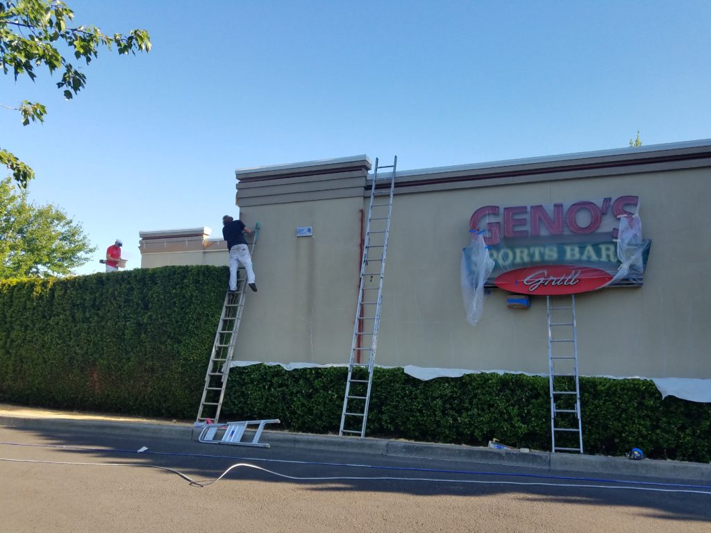 Exterior commercial painting in portland Oregon. Cascade painting and restoration Geno's sports bar commercial building
